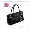 2012 hot high-grade leather bag with lovely bear accessories