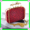 Animal print clutch bag with skull