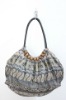 Beaded fabric handbag with PU handle