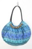 Beaded fabric handbag with PU handle