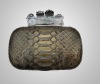 Beautiful  python snake skin four ring skull lady clutch bag