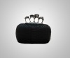 Black  python skin four ring skull lady clutch bag