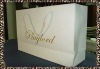 Elegant shopping bag with logo foil stamping . gift paper bag for boutique