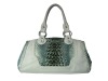 Fashionable crocodile skin handbag