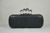 Four Ring skull black python skin clutch bag