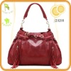 Fringe and chain decorative polished PU handbag