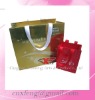 Golden lamanation ribbon handle Jewelry Boutique paper bag
