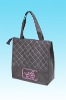 Handled nonwoven zipper bag
