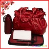 Large compartment designer leather mummy bag