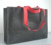 Nonwoven black promotional bag with PP handle