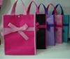 Nonwoven folding shopping bag