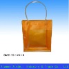 Orange PVC handle bag with professional design