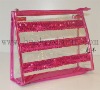 PVC cosmetic bag with magenta sequins