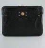 Pebbled patent leather laptop sleeve
