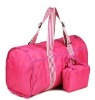 Pink nylon folding travel bag