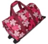 Polyester flowre travel bag with wheel for support