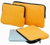 Quality orange Neoprene laptop sleeve load from top with zipper