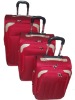 Red color trolley luggage
