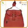 Red genuine leather sling bag with magnetic closure