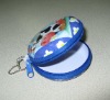 Round tin coin wallet