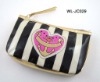 STRIPED CLUTCH BAG