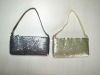 Shining fabric handbag in gold and silver