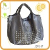 Simply designed women handbag with stud decoration