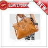 Women commuting big genuine leather handbag