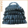 Women's designer handbags with tassels