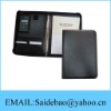 Zippered leather portfolio with memo book and calculator