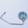 blue circle shaped handbag unfolding hook