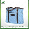 blue fabric lady hand bag with outside pocke and pu handle