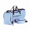 bright colour duffel bag with a removable backpack and a waist bag