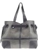 fabric with trimmed leather handbag