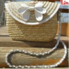 girl's beige straw bag