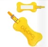 golden yellow luggage tag