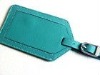 green leather luggage tag
