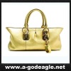 ladies fashion bag in warm yellow color