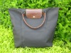 ladies woven leather handbag