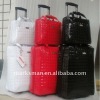 patent leather trolley bag and hand bag