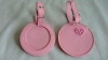 pink round leather luggage tags