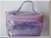 purple PVC cosmetic bag with handle