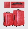 red color trolley luggage
