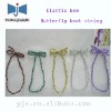 stretch loop with pre-tied bow used in box packaging