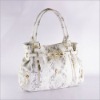 white and black Snake PU handbag