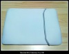 white computer notebook bag