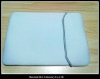 white computer notebook bag