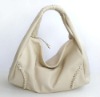 white leather handbag