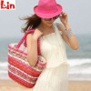 women's red straw bag